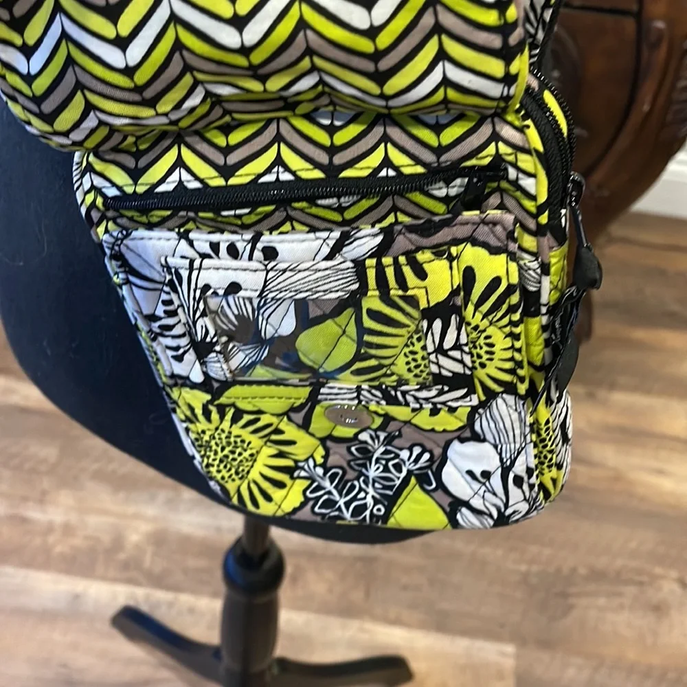 Vera Bradley crossbody brown with yellow. Built in organizer.